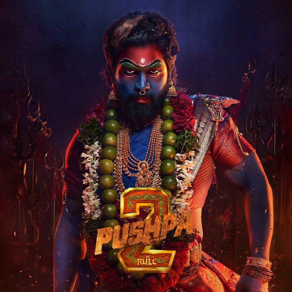 Allu Arjun in a fierce traditional look with vibrant face paint and jewelry in Pushpa 2: The Rule.